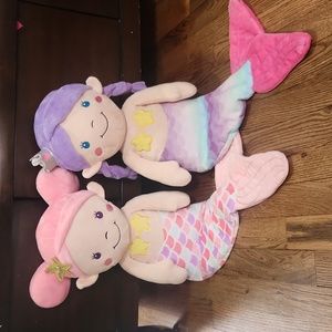 Bundle of sitting stuffed animal mermaids